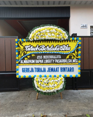 Papan Bunga Duka di Rajawali
