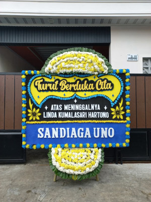 Papan Bunga Duka di Rajawali